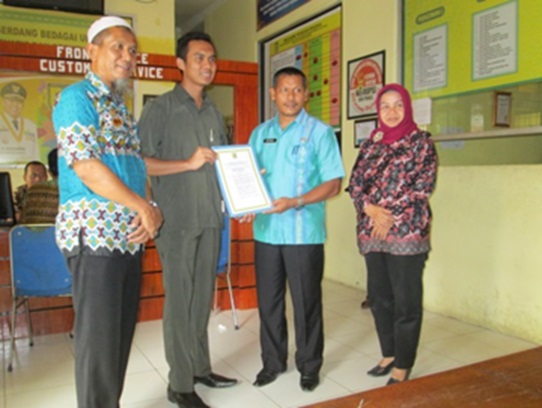 Penyerahan Izin.jpg